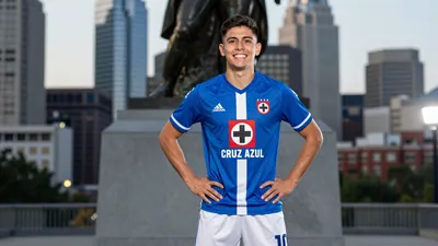 A photorealistic image of a young, anonymous Cruz Azul player, wearing a blue jersey with a white stripe, and a white...
