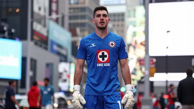 A photorealistic image of an anonymous Cruz Azul player, wearing a blue jersey and blue shorts, with a white goalkeeper...